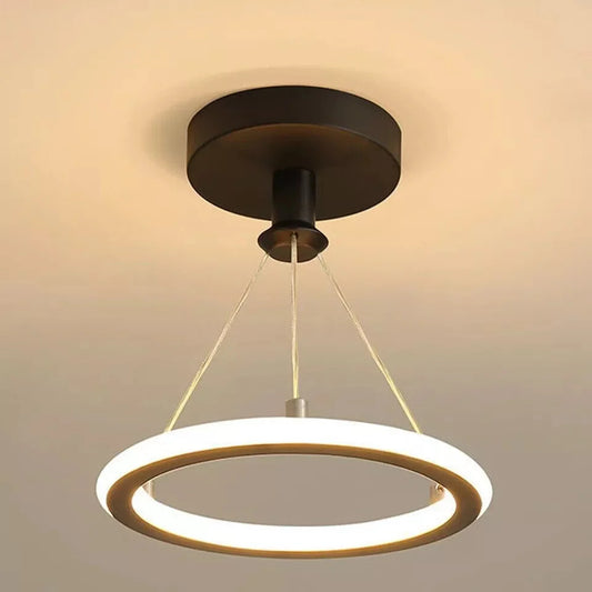 Ceiling-mounted-ring-light-fixture-on-a-neutral-background
