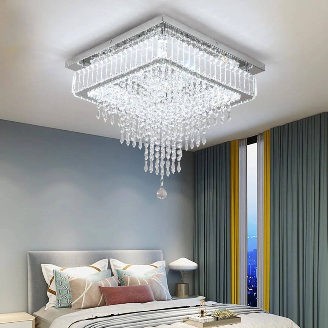 Crystal-ceiling-light-fixture-in-a-bedroom-with-a-bed-and-window