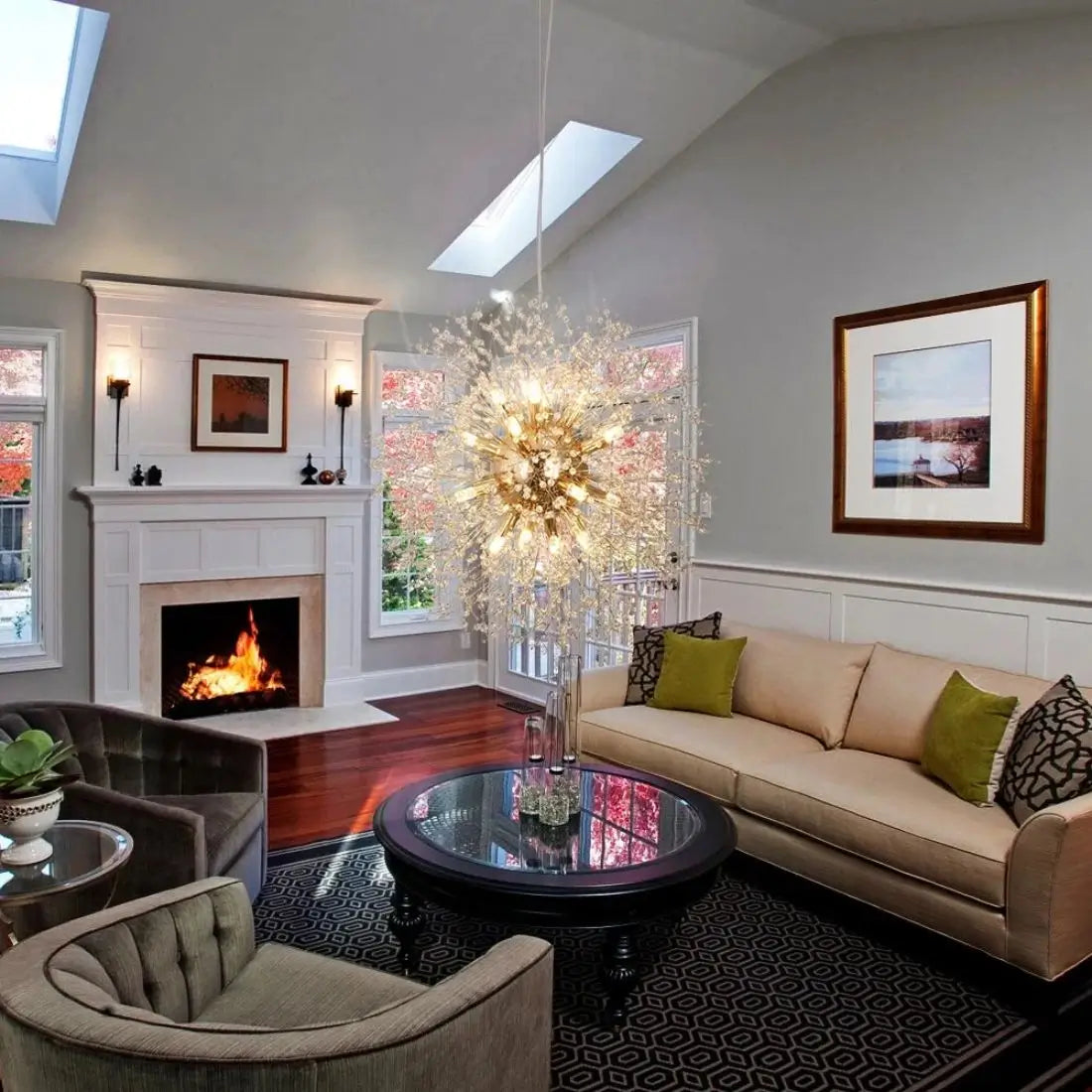 Living room with beige sofa, armchair, and chandelier