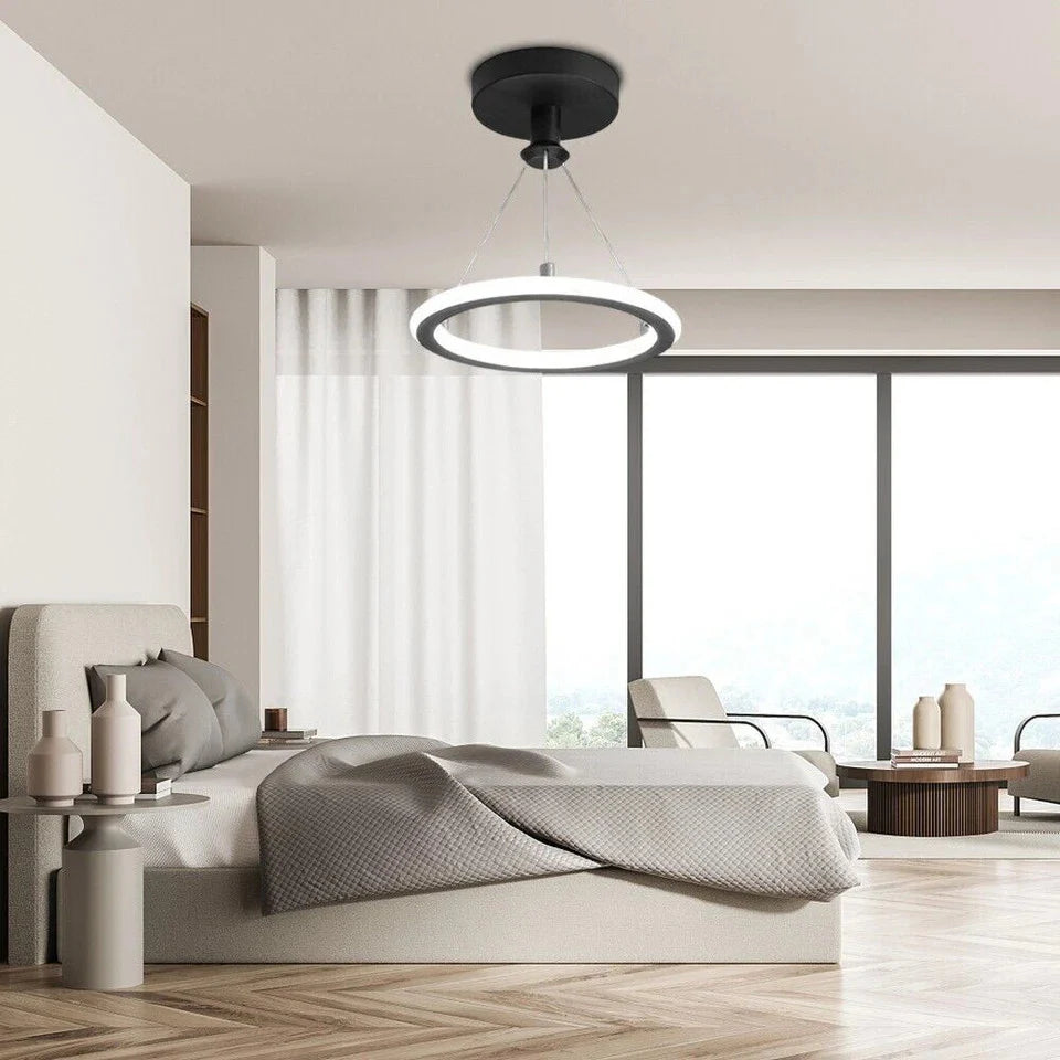 Modern-bedroom-with-a-bed-side-tables-and-a-ceiling-light-fixture
