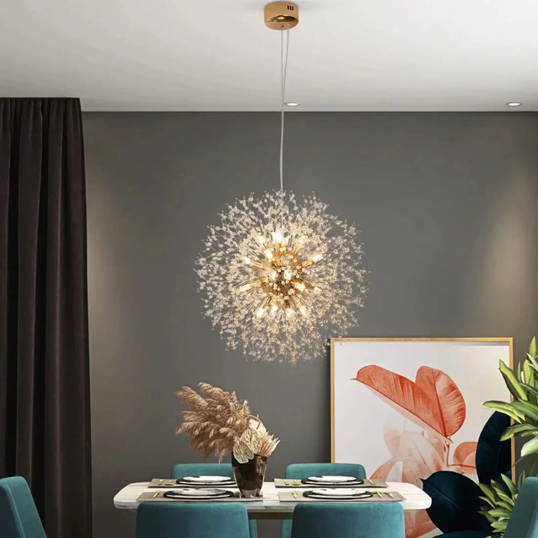 Modern dining room with a decorative chandelier, table setting, and wall art
