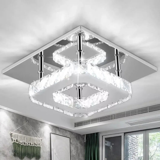 Modern crystal ceiling light fixture in a room with windows and decor
